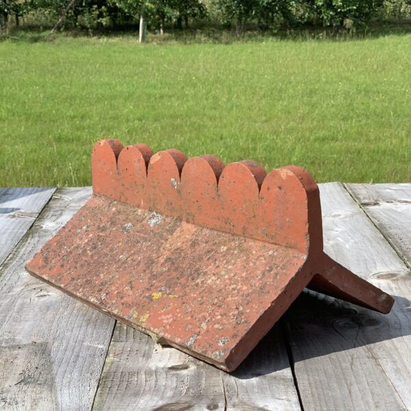 Decorative clay ridge tiles
