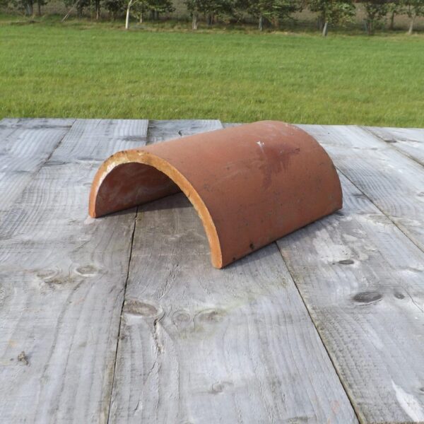 Clay half round ridge tiles