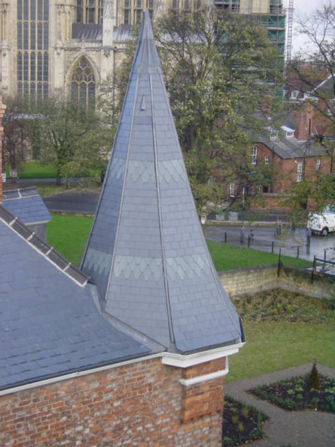 Traditional building roof finished in Welsh Penrhyn slates