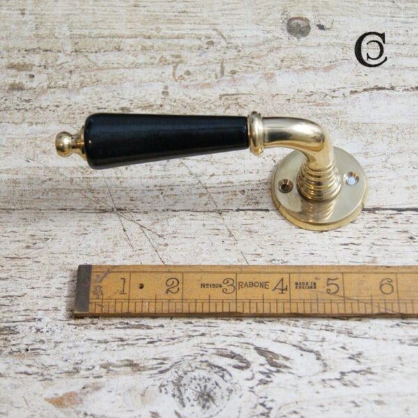 Lever Handle on Round Rose Ebony Ceramic and Brass 120mm