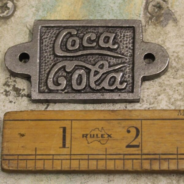 Plaque COKE Fits Cap Catcher Cast Antique Iron