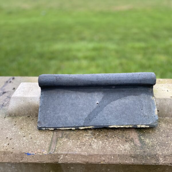 Reclaimed Staffordshire Blue roll ridge tile in 460–300 size, ideal for period roof repairs, extensions, and heritage roofing projects.