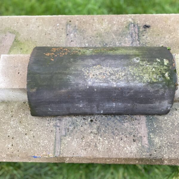 Alternative view of Reclaimed Clay Ridge Tile – Company 470-260 brown Half Round.
