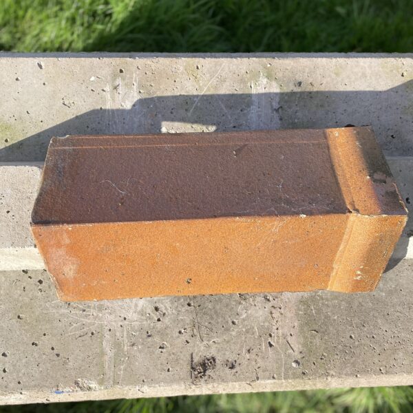 Alternative view of Reclaimed Orange / Terracotta Clay Angle Cap Ridge Tile – 500-260