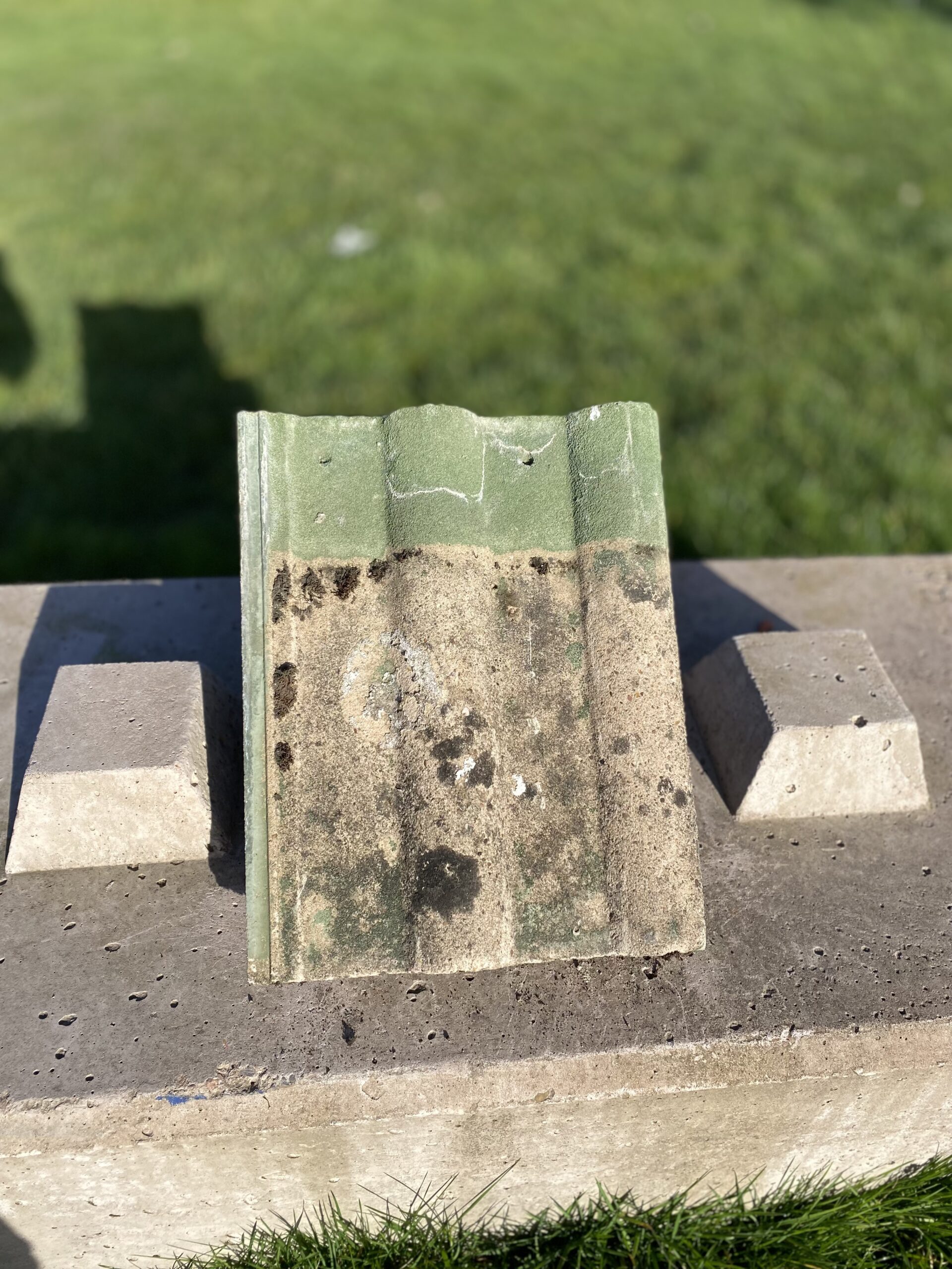 Profile of reclaimed concrete roof tiles