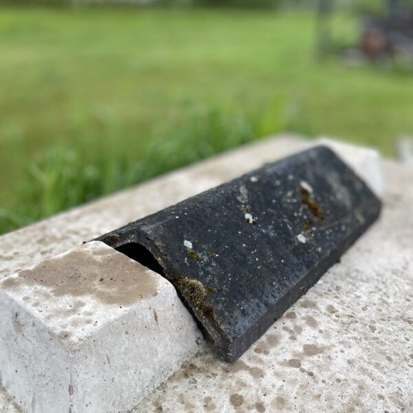 Alternative view of Reclaimed Black Concrete Stepped Angled Ridge Tile 120-250-450