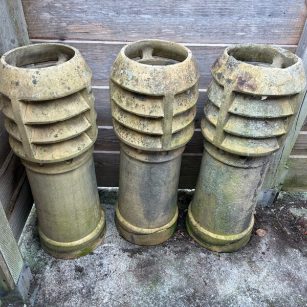 3 matching chimney pots